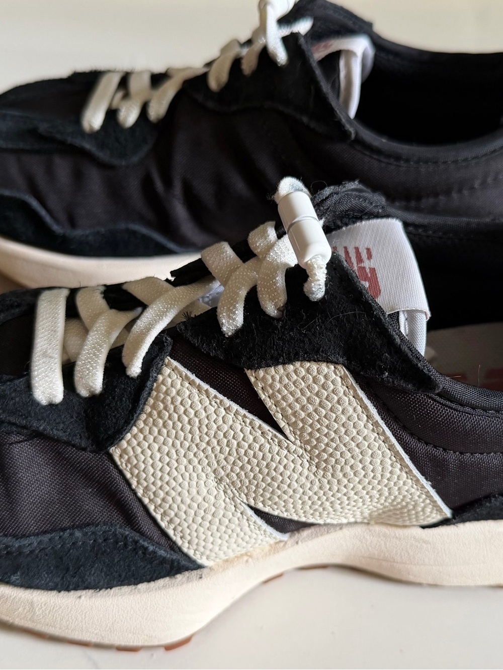New Balance Black and white women's Casual Sneakers